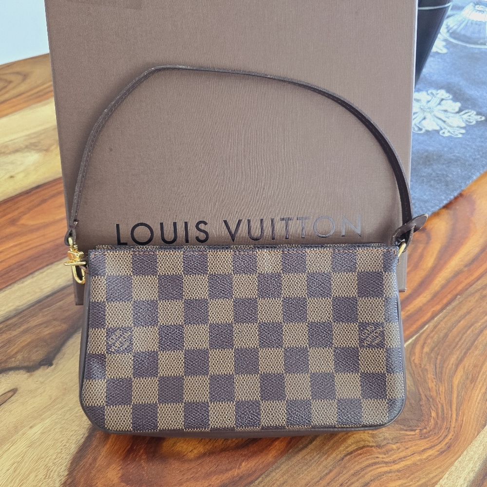 Authentic Louis Vuitton Navona damier ebene with original box.